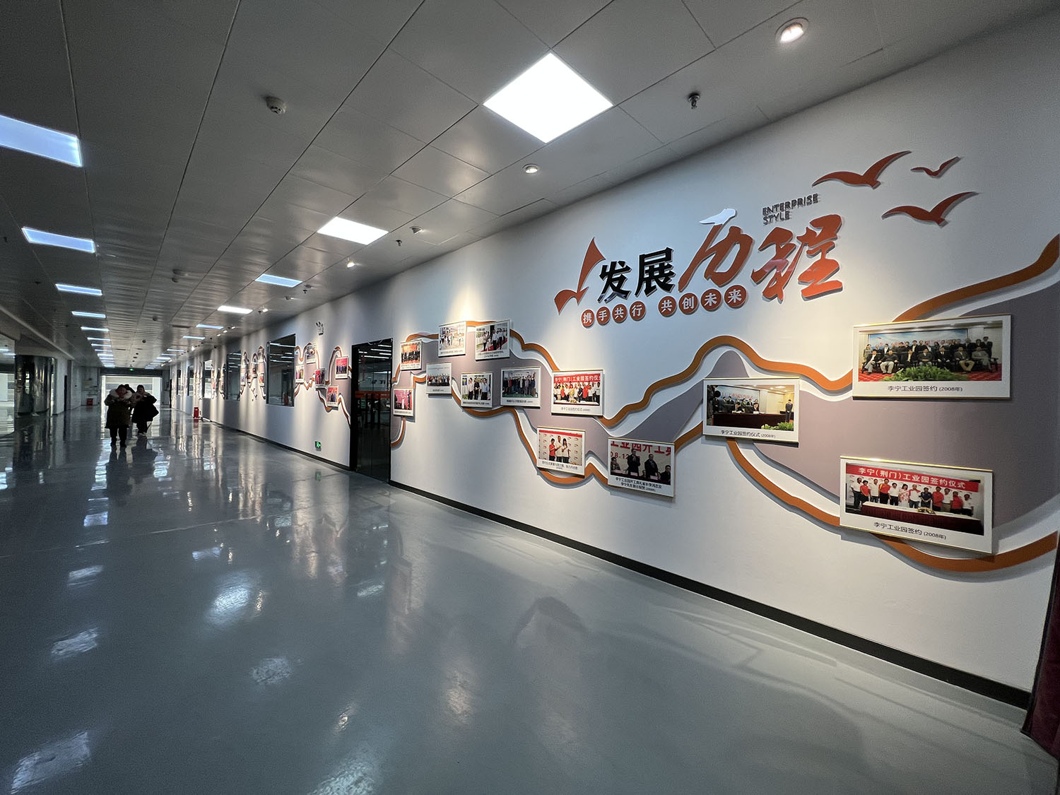 發(fā)展歷程 鷹美制衣發(fā)展歷程文化墻三